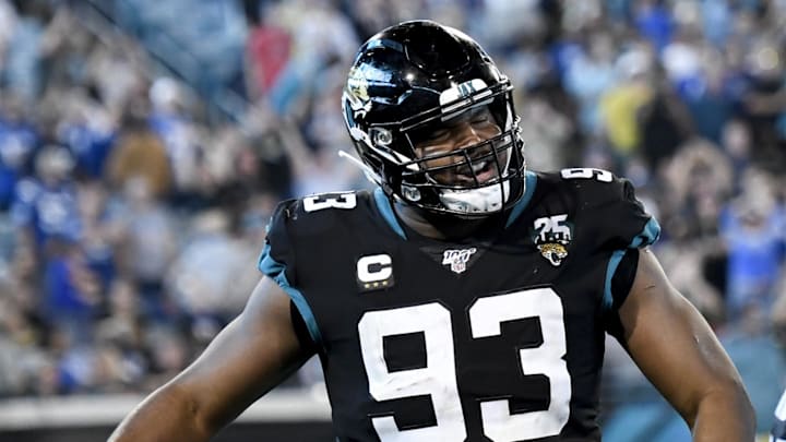 Dec 29, 2019; Jacksonville, Florida, USA; Jacksonville Jaguars defensive end Calais Campbell (93) reacts after scoring a touchdown on a fumble during the fourth quarter against the Indianapolis Colts at TIAA Bank Field. Mandatory Credit: Douglas DeFelice-Imagn Images