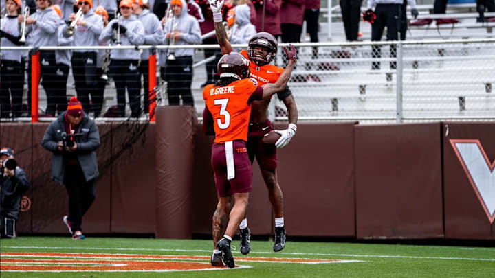 Virginia Tech receivers Donovan Greene (3) and Cameron Seldon (9) celebrate a touchdown during the 2025 spring game.
