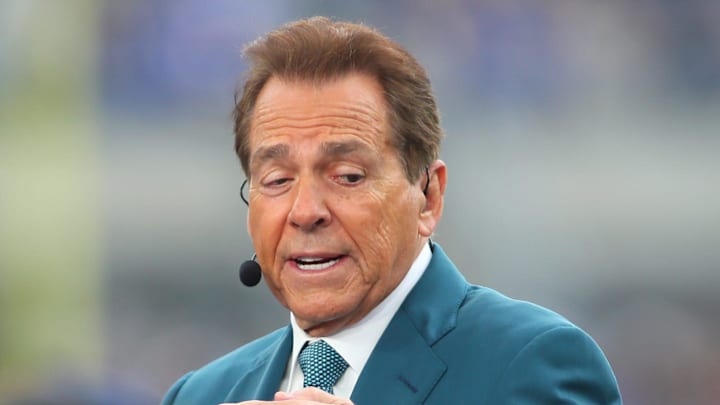 ESPN analyst and retired Alabama head coach Nick Saban broadcasts live from the sidelines of Acrisure Stadium in Pittsburgh, PA prior to the start of the Pittsburgh Panthers vs Notre Dame Fighting Irish game on November 15, 2025.