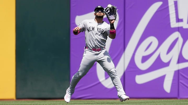 May 11, 2025; West Sacramento, California, USA; New York Yankees left fielder Jasson Dominguez (24) catches a fly ball against the Athletics in the first inning at Sutter Health Park.