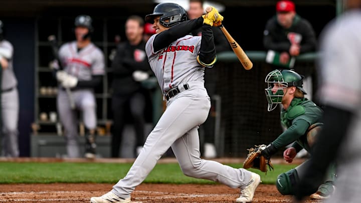 Lugnuts' Brayan Buelvas drives in a run against Michigan State in the fourth inning on Wednesday, April 3, 2024, during the Crosstown Showdown at Jackson Field in Lansing.