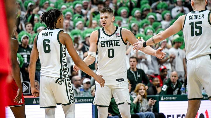 Michigan State's Jaxon Kohler, center, celebrates with Jordan Scott, left, and Carson Cooper after Kohler's 3-pointer against Rutgers during the second half on Thursday, March 5, 2026, at the Breslin Center in East Lansing. Michigan State's Jaxon Kohler, center, celebrates with Jordan Scott, left, and Carson Cooper after Kohler's 3-pointer against Rutgers during the second half on Thursday, March 5, 2026, at the Breslin Center in East Lansing.