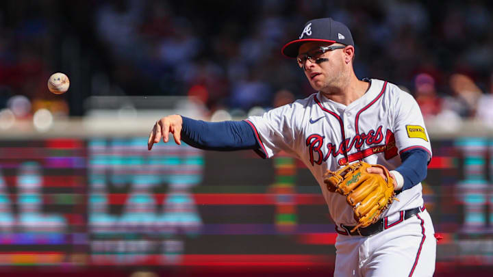 Allen releasing a ball as he throws it for an out for the Brave Allen releasing a ball as he throws it for an out for the Brave