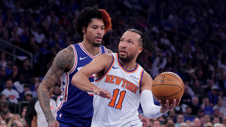 May 4, 2026; New York, New York, USA; New York Knicks guard Jalen Brunson (11) drives to the basket against Philadelphia 76ers forward Kelly Oubre Jr. (9) during the first quarter of game one of the eastern conference semifinal round of the 2026 NBA Playoffs at Madison Square Garden. Mandatory Credit: Brad Penner-Imagn Images