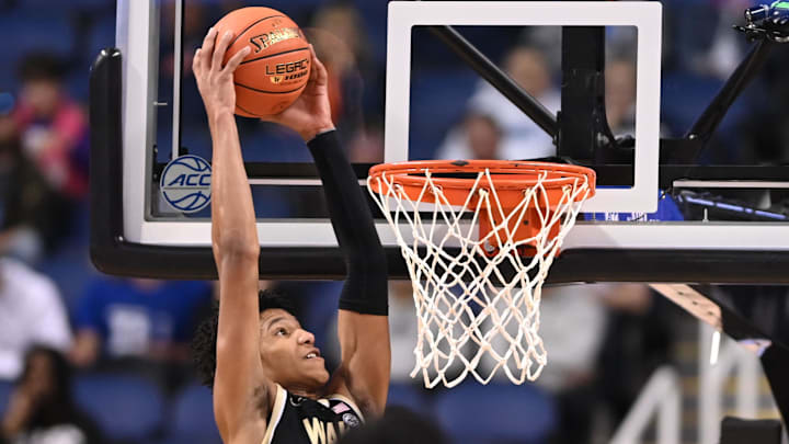 Mar 8, 2023; Greensboro, NC, USA; Wake Forest Demon Deacons forward Bobi Klintman (34) scores in the second half of the second round at Greensboro Coliseum. Mandatory Credit: Bob Donnan-Imagn Images Mar 8, 2023; Greensboro, NC, USA; Wake Forest Demon Deacons forward Bobi Klintman (34) scores in the second half of the second round at Greensboro Coliseum. Mandatory Credit: Bob Donnan-Imagn Images
