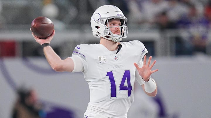 Dec 16, 2024; Minneapolis, Minnesota, USA; Minnesota Vikings quarterback Sam Darnold (14) passes the ball against the Chicago Bears in the fourth quarter at U.S. Bank Stadium. Dec 16, 2024; Minneapolis, Minnesota, USA; Minnesota Vikings quarterback Sam Darnold (14) passes the ball against the Chicago Bears in the fourth quarter at U.S. Bank Stadium.