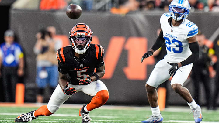 Cincinnati Bengals wide receiver Tee Higgins (5) makes a catch against Detroit Lions cornerback Rock Ya-Sin (23)during the second half at Paycor Stadium in Cincinnati on Sunday, Oct. 5, 2025.