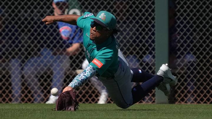 Mar 12, 2026; Mesa, Arizona, USA; Seattle Mariners shortstop Michael Arroyo (96) dives for the ball against the Chicago Cubs in the third inning at Sloan Park. Mandatory Credit: Rick Scuteri-Imagn Images Mar 12, 2026; Mesa, Arizona, USA; Seattle Mariners shortstop Michael Arroyo (96) dives for the ball against the Chicago Cubs in the third inning at Sloan Park. Mandatory Credit: Rick Scuteri-Imagn Images