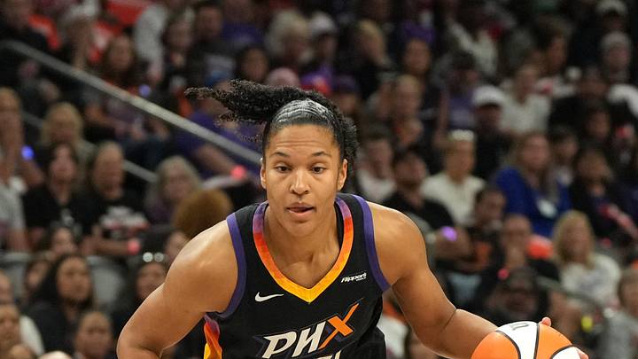 Sep 28, 2025; Phoenix, Arizona, USA; Phoenix Mercury forward Alyssa Thomas (25) drives against the Minnesota Lynx in the first half during game four of the second round for the 2025 WNBA Playoffs at PHX Arena. Mandatory Credit: Rick Scuteri-Imagn Images