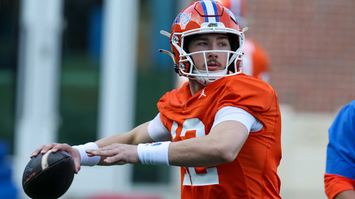Florida quarterback Aaron Philo (12) throws during the first day of Florida Spring football practice at Heavener Football Center in Gainesville, FL on Tuesday, March 3, 2026. [Alan Youngblood/Gainesville Sun]