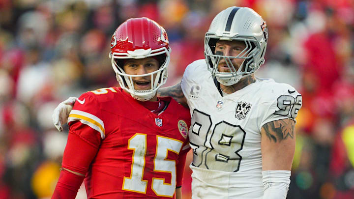 Nov 29, 2024; Kansas City, Missouri, USA; Kansas City Chiefs quarterback Patrick Mahomes (15) and Las Vegas Raiders defensive end Maxx Crosby (98) embrace during the second half at GEHA Field at Arrowhead Stadium. Mandatory Credit: Jay Biggerstaff-Imagn Images Nov 29, 2024; Kansas City, Missouri, USA; Kansas City Chiefs quarterback Patrick Mahomes (15) and Las Vegas Raiders defensive end Maxx Crosby (98) embrace during the second half at GEHA Field at Arrowhead Stadium. Mandatory Credit: Jay Biggerstaff-Imagn Images