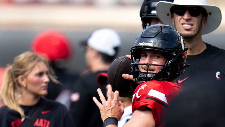 Cincinnati Bearcats quarterback JC French (4) throws a pass during the Cincinnati Bearcats football practice at Nippert Stadium in Cincinnati on Saturday, Aug. 8, 2026. Cincinnati Bearcats quarterback JC French (4) throws a pass during the Cincinnati Bearcats football practice at Nippert Stadium in Cincinnati on Saturday, Aug. 8, 2026.