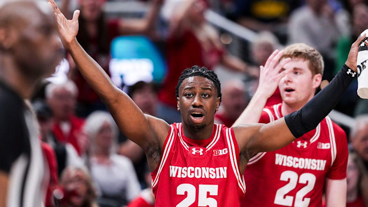 Wisconsin Badgers guard John Blackwell (25) and Wisconsin Badgers forward Steven Crowl (22) react to a call Saturday, March 15, 2025, in a semifinals game at the 2025 TIAA Big Ten Men’s Basketball Tournament between the Michigan State Spartans and the Wisconsin Badgers at Gainbridge Fieldhouse in Indianapolis.