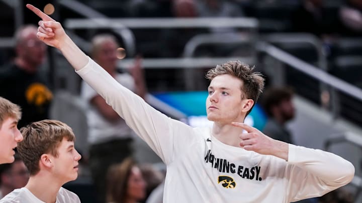 Iowa Hawkeyes forward Riley Mulvey (44) celebrates the team’s possession of the ball Wednesday, March 12, 2025, in a first round game at the 2025 TIAA Big Ten Men’s Basketball Tournament between the Iowa Hawkeyes and the Ohio State Buckeyes at Gainbridge Fieldhouse in Indianapolis. The Hawkeyes defeated the Buckeyes, 77-70.
