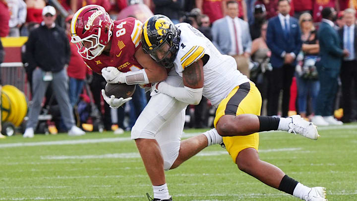 Iowa State Cyclones' tight end Gabe Burkle (84) gets tackle Iowa Hawkeyes defensive back Xavier Nwankpa after making a catch during the fourth quarter in the Cy-Hawk football at Jack Trice Stadium on Sept. 6, 2025, in Ames, Iowa Iowa State Cyclones' tight end Gabe Burkle (84) gets tackle Iowa Hawkeyes defensive back Xavier Nwankpa after making a catch during the fourth quarter in the Cy-Hawk football at Jack Trice Stadium on Sept. 6, 2025, in Ames, Iowa