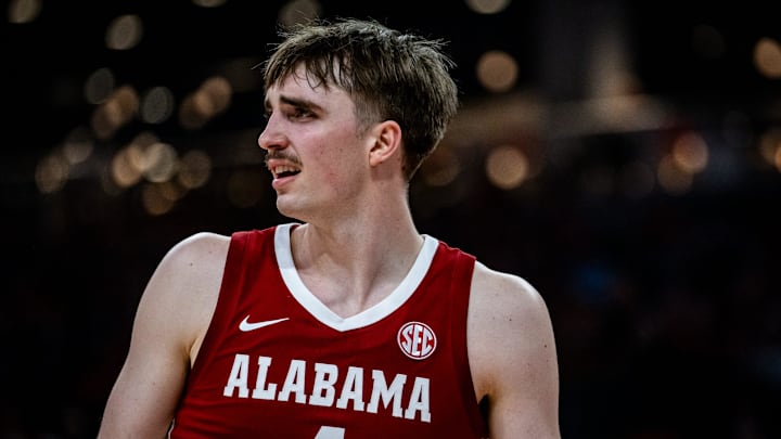 Alabama Crimson Tide forward Grant Nelson (4) questions a call by the referees in the first half as the Texas Longhorns take on the Crimson Tide at the Moody Center, Feb. 11, 2025.