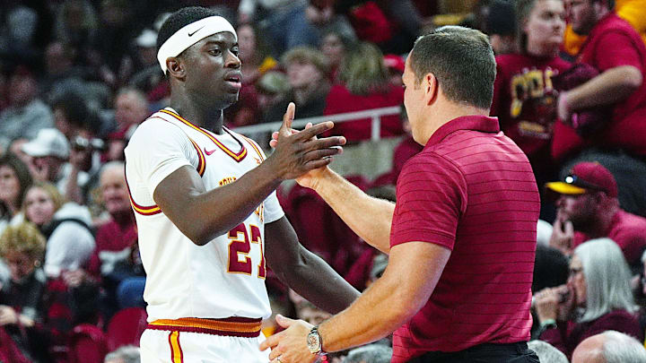 Iowa State Cyclones forward Killyan Toure (27) gets congratulation from men's basketball head coach T.J. Otzelberger during the second half against UCF in the Big-12 conference game on Jan. 20, 2026, at Hilton Coliseum in Ames, Iowa.