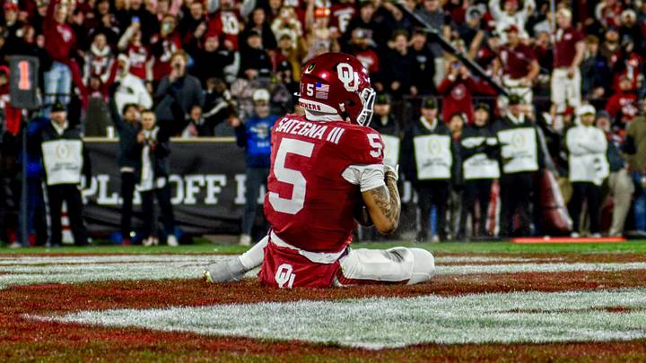 Oklahoma wide receiver Isaiah Sategna catches a touchdown pass against Alabama in the CFP. Oklahoma wide receiver Isaiah Sategna catches a touchdown pass against Alabama in the CFP.