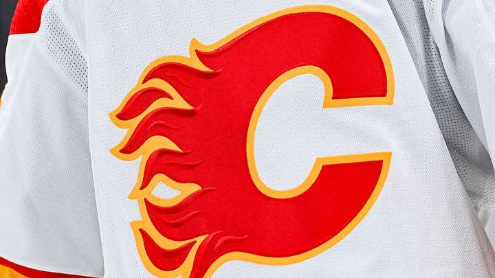 Dec 12, 2022; Montreal, Quebec, CAN; View of a Calgary Flames logo on a jersey worn by the member of the team during the second period at Bell Centre. Mandatory Credit: David Kirouac-USA TODAY Sports