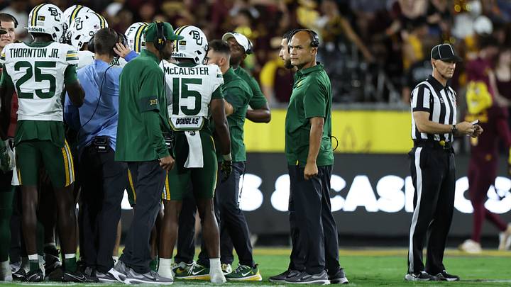 Oct 3, 2026; Tempe, Arizona, USA; Baylor Bears head coach Dave Aranda looks to the field against the Arizona State Sun Devils during the second quarter at Mountain America Stadium. Mandatory Credit: Anna Carrington-Imagn Images Oct 3, 2026; Tempe, Arizona, USA; Baylor Bears head coach Dave Aranda looks to the field against the Arizona State Sun Devils during the second quarter at Mountain America Stadium. Mandatory Credit: Anna Carrington-Imagn Images