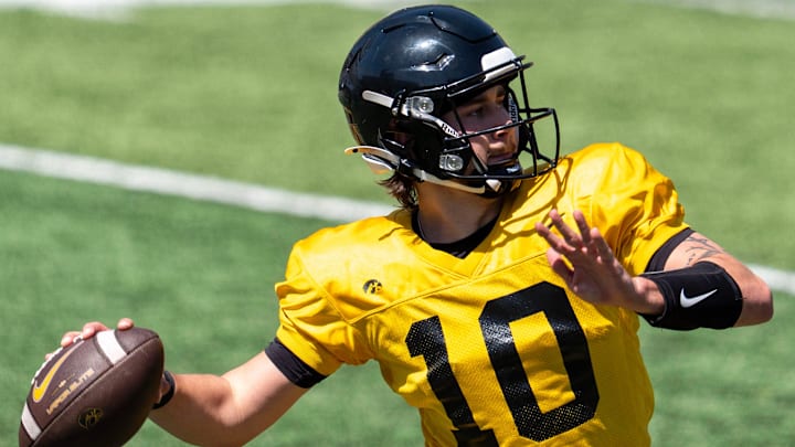 Iowa quarterback Jeremy Hecklinski (10) passes the football April 25, 2026 during the team’s spring practice at Kinnick Stadium in Iowa City, Iowa.