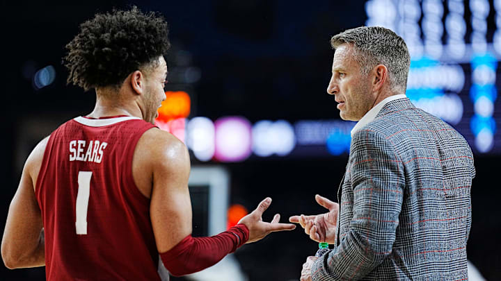 Alabama guard Mark Sears (1) talks with head coach Nate Oats during the Final Four semifinal game against Connecticut at State Farm Stadium.