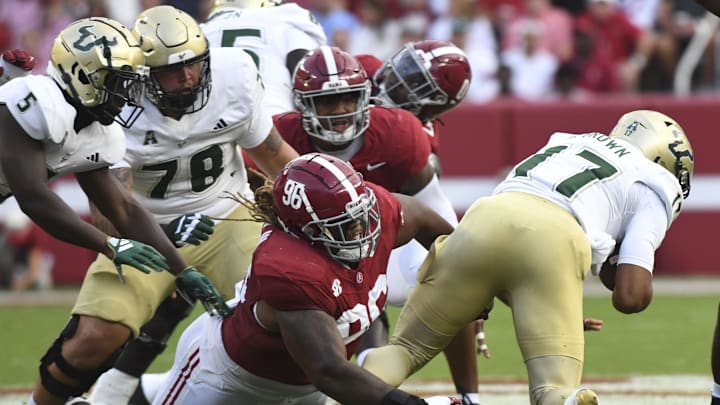 Sep 7, 2024; Tuscaloosa, Alabama, USA;  Alabama Crimson Tide defensive lineman Tim Keenan III (96) tackles South Florida Bulls quarterback Byrum Brown (17) during the first half at Bryant-Denny Stadium. Mandatory Credit: Gary Cosby Jr.-Imagn Images
