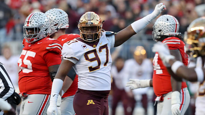 Nov 18, 2023; Columbus, Ohio, USA; Minnesota Golden Gophers defensive lineman Jalen Logan-Redding (97) celebrates a third down stop during the first quarter against the Ohio State Buckeyes at Ohio Stadium. Nov 18, 2023; Columbus, Ohio, USA; Minnesota Golden Gophers defensive lineman Jalen Logan-Redding (97) celebrates a third down stop during the first quarter against the Ohio State Buckeyes at Ohio Stadium.