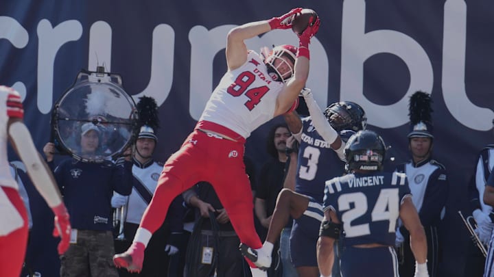 September 14 2024: Utah Utes tight end Caleb Lohner (84) catches a pass for a touchdown during the game with Utah Utes and Utah State held at Merlin Olson Field in Logan, Ut. 