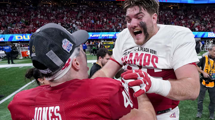 Indiana linebacker Isaiah Jones and left tackle Carter Smith celebrate Jan. 9, 2026, after defeating Oregon in the Peach Bowl and semifinal game of the College Football Playoff at Mercedes-Benz Stadium in Atlanta.