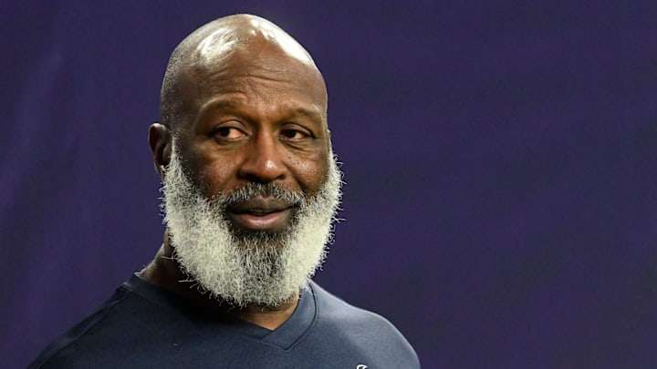 Texans head football coach Lovie Smith stands on the field before the Texas Tech-Ole Miss Texas Bowl