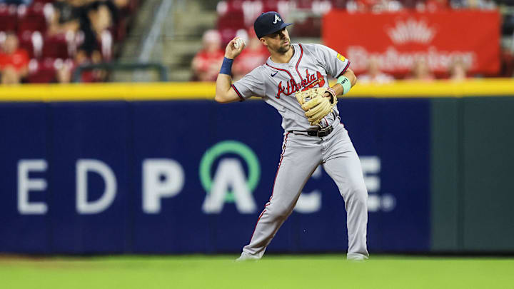 Sep 17, 2024; Cincinnati, Ohio, USA; Atlanta Braves second baseman Whit Merrifield (15) throws to first to get Cincinnati Reds shortstop Elly De La Cruz (not pictured) out in the third inning at Great American Ball Park.