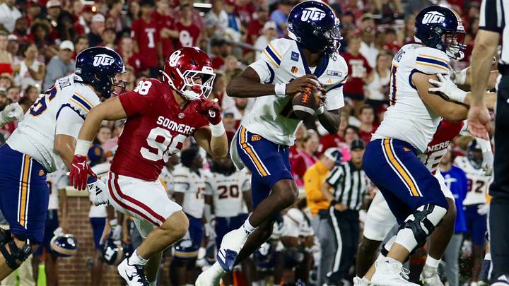 Oklahoma defensive end Jake Kreul pursues UTEP quarterback Raymond Moore III. Oklahoma defensive end Jake Kreul pursues UTEP quarterback Raymond Moore III.