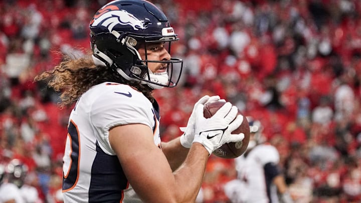 Oct 12, 2023; Kansas City, Missouri, USA; Denver Broncos tight end Greg Dulcich (80) warms up against the Kansas City Chiefs prior to a game at GEHA Field at Arrowhead Stadium. Mandatory Credit: Denny Medley-Imagn Images