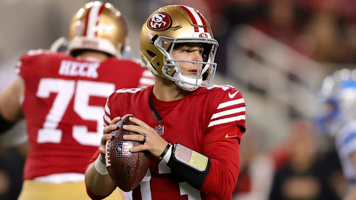 San Francisco 49ers quarterback Brock Purdy looks to throw a pass. San Francisco 49ers quarterback Brock Purdy looks to throw a pass.