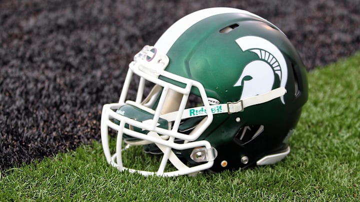 Sep 4, 2015; Kalamazoo, MI, USA; General view of Michigan State Spartans helmet on field prior to a game against Western Michigan at Waldo Stadium. Mandatory Credit: Mike Carter-Imagn Images