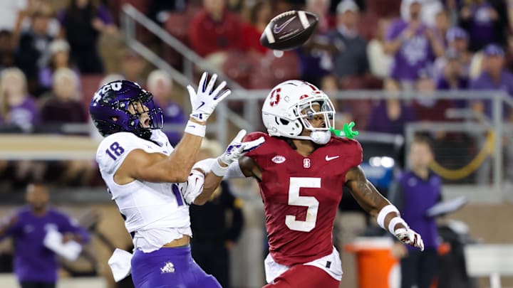 Aug 30, 2024; Stanford, California, USA; TCU Horned Frogs wide receiver Jack Bech (18) catches a pass against Stanford Cardinal safety Jay Green (5) during the second quarter at Stanford Stadium. Mandatory Credit: Sergio Estrada-Imagn Images Aug 30, 2024; Stanford, California, USA; TCU Horned Frogs wide receiver Jack Bech (18) catches a pass against Stanford Cardinal safety Jay Green (5) during the second quarter at Stanford Stadium. Mandatory Credit: Sergio Estrada-Imagn Images