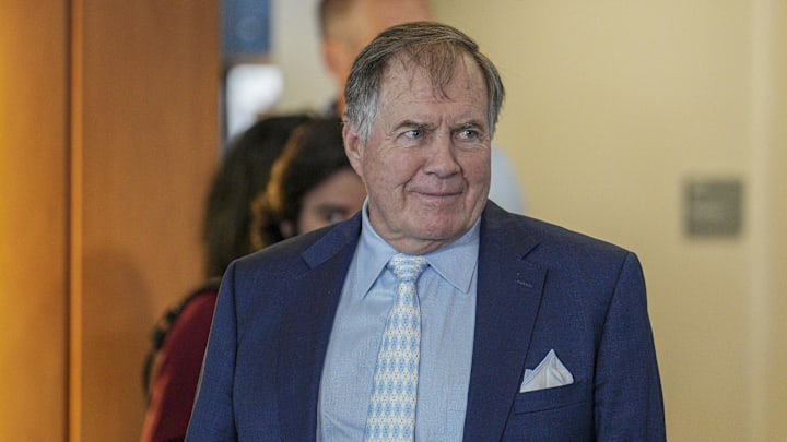 Dec 12, 2024; Chapel Hill, NC, USA; North Carolina Tar Heels new head coach Bill Belichick walks to his seat for the announcement of his hiring at Loudermilk Center for Excellence. Dec 12, 2024; Chapel Hill, NC, USA; North Carolina Tar Heels new head coach Bill Belichick walks to his seat for the announcement of his hiring at Loudermilk Center for Excellence.