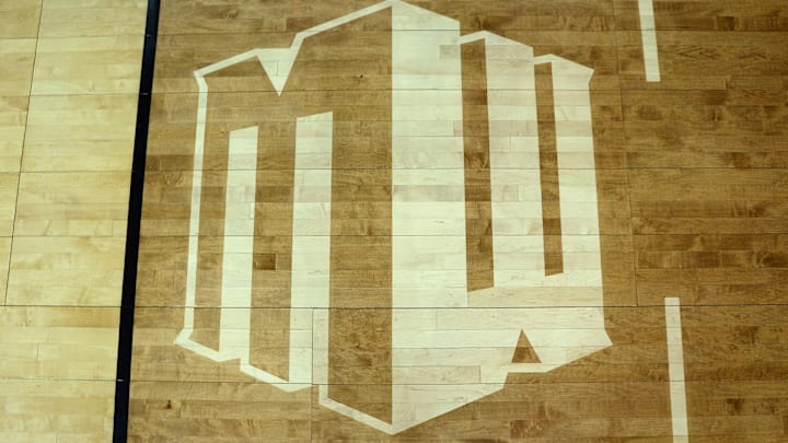 A detailed view of the Mountain West logo on the baseline seen before the Conference tournament final between the San Diego State Aztecs and the Utah State Aggies at Thomas and Mack Center. Mandatory Credit: Orlando Ramirez-Imagn Images A detailed view of the Mountain West logo on the baseline seen before the Conference tournament final between the San Diego State Aztecs and the Utah State Aggies at Thomas and Mack Center. Mandatory Credit: Orlando Ramirez-Imagn Images