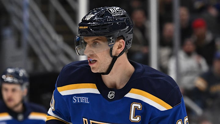Jan 14, 2025; St. Louis, Missouri, USA; St. Louis Blues center Brayden Schenn (10) looks on against the Calgary Flames in the first period at Enterprise Center. Mandatory Credit: Joe Puetz-Imagn Images