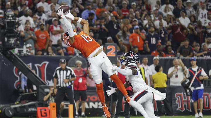 Sep 15, 2024; Houston, Texas, USA; Chicago Bears wide receiver Rome Odunze (15) attempts to catch a pass for a touchdown as Houston Texans cornerback Kamari Lassiter (4) defends during the second quarter at NRG Stadium. Mandatory Credit: Troy Taormina-Imagn Images