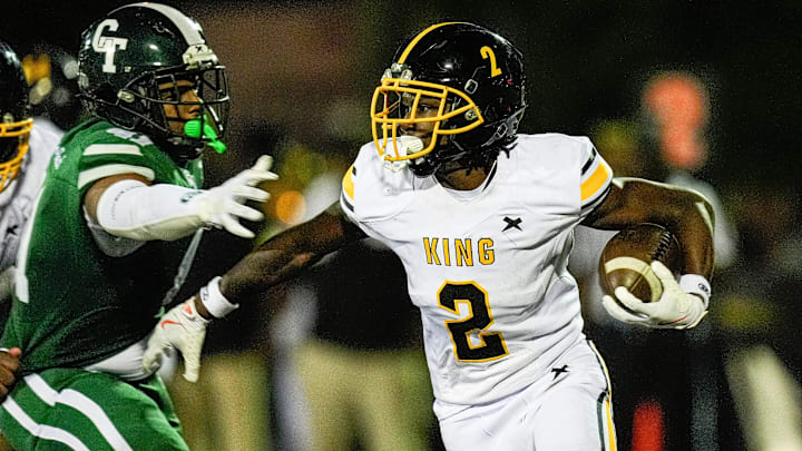 Detroit King running back Michael Dukes (2) runs against Cass Tech during the first half at Cass Tech High School in Detroit on Friday, Sept. 20, 2024.