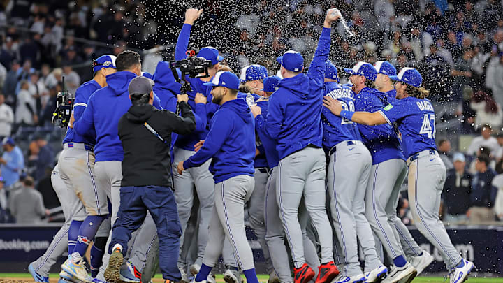 The Toronto Blue Jays celebrate after beating the New York Yankees to win the ALDS round for the 2025 MLB playoffs. 