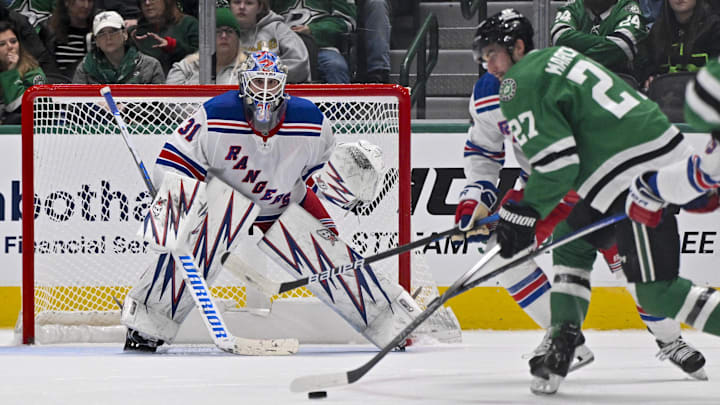 Dec 20, 2024; Dallas, Texas, USA; New York Rangers goaltender Igor Shesterkin (31) faces a shot by Dallas Stars left wing Mason Marchment (27) during the third period at the American Airlines Center. Mandatory Credit: Jerome Miron-Imagn Images