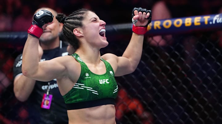Sep 16, 2023; Las Vegas, Nevada, USA; Loopy Godinez (red gloves) reacts after defeating Elise Reed