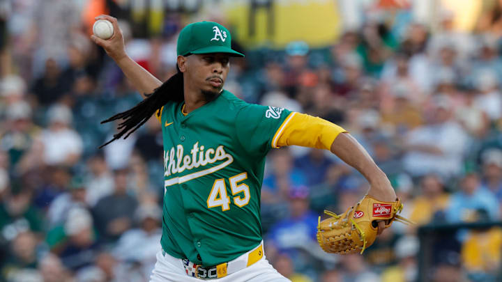Aug 26, 2025; West Sacramento, California, USA; Athletics pitcher Osvaldo Bido (45) throws a pitch during the first inning against the Detroit Tigers at Sutter Health Park. Mandatory Credit: Sergio Estrada-Imagn Images