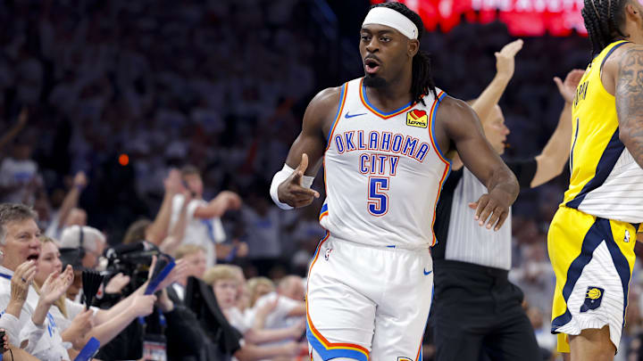 Jun 5, 2025; Oklahoma City, Oklahoma, USA; Oklahoma City Thunder guard Luguentz Dort (5) celebrates making a three point basket as Indiana Pacers forward Obi Toppin (1) looks on during the third quarter during game one of the 2025 NBA Finals at Paycom Center. Mandatory Credit: Alonzo Adams-Imagn Images Jun 5, 2025; Oklahoma City, Oklahoma, USA; Oklahoma City Thunder guard Luguentz Dort (5) celebrates making a three point basket as Indiana Pacers forward Obi Toppin (1) looks on during the third quarter during game one of the 2025 NBA Finals at Paycom Center. Mandatory Credit: Alonzo Adams-Imagn Images