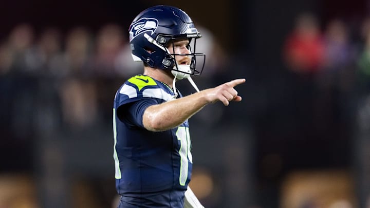 Seahawks quarterback Sam Darnold (14) reacts against the Cardinals in Week 4.