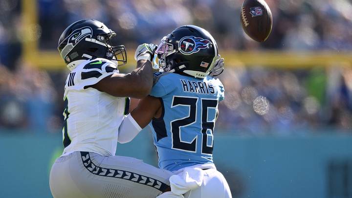 Nov 23, 2025; Nashville, Tennessee, USA; Tennessee Titans cornerback Marcus Harris (26) breaks up a pass for Seattle Seahawks running back Kenneth Walker III (9) during the first half at Nissan Stadium. Mandatory Credit: Steve Roberts-Imagn Images Nov 23, 2025; Nashville, Tennessee, USA; Tennessee Titans cornerback Marcus Harris (26) breaks up a pass for Seattle Seahawks running back Kenneth Walker III (9) during the first half at Nissan Stadium. Mandatory Credit: Steve Roberts-Imagn Images
