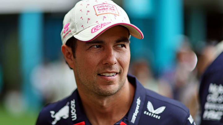 May 5, 2024; Miami Gardens, Florida, USA; Red Bull Racing driver Sergio Perez (11) walks in the May 5, 2024; Miami Gardens, Florida, USA; Red Bull Racing driver Sergio Perez (11) walks in the